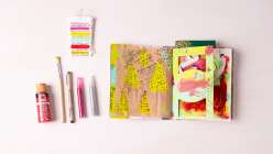 A colorful spread of pages in Dawn Sokol's art journal from her Holiday Art Journaling class on Creativebug.