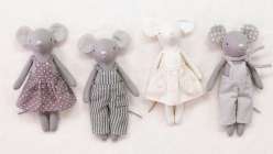 Four tiny gray sewn mice dolls made in Katia Ferris's Sew a a Mouse Doll class on Creativebug 
