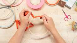Rebecca Ringquist wrapping an embroidery hoop in her Essential Embroidery Techniques class on Creativebug