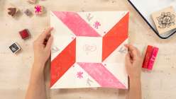 An unfolded, completed Valentine's Day-themed folded Victorian puzzle purses made in Courtney Cerruti's Make a Victorian Puzzle Purse class on Creativebug.