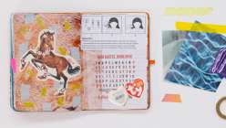 A colorful junk journal spread made by Faith Hale in her Junk Journaling Daily Practice class on Creativebug.