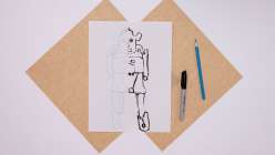 A toy robot drawn with both hands simultaneously by e bond in her Drawing Disrupted: 15 Experiments class on Creativebug.