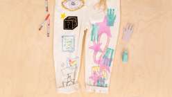 The pants of a jumpsuit embellished by Risa Iwisaki Culbertson in her class Wearable Wins on Creativebug