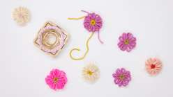 A selection of hand-loomed flowers made by crochet artist Twinkie Chan in her Flower Loom Basics class on Creativebug 