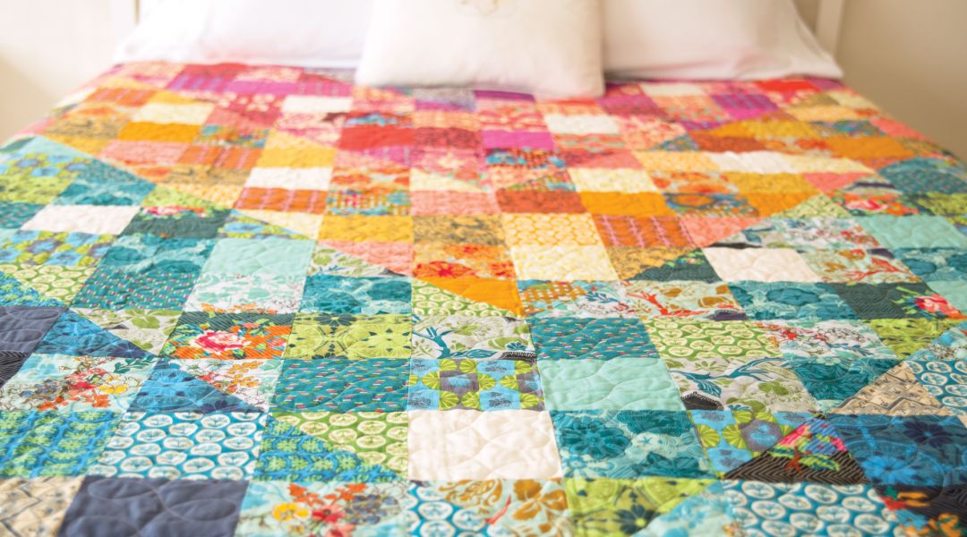 Color Dive Half-Square Triangle Quilt